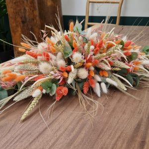 Le centre de table en fleurs séchées